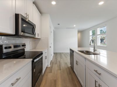 Kitchen in the Everglade floorplan at 209 Links Terrace Blvd