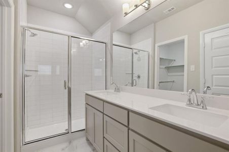 Primary bathroom in the Pulitzer home plan by Trophy Signature Homes – REPRESENTATIVE PHOTO