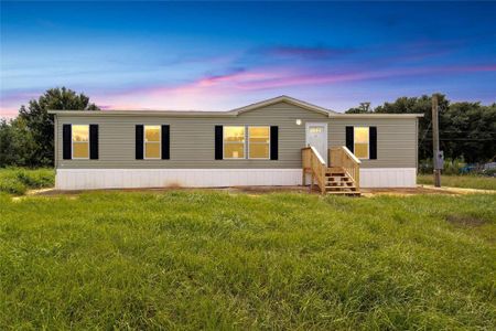 New construction Manufactured Home house 10109 Old Spanish Trail, Polk City, FL 33868 - photo 0