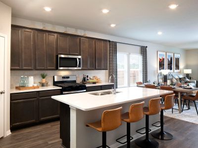 The expansive kitchen island is perfect for hosting and preparing meals.