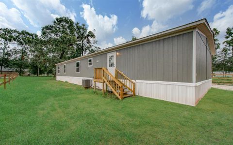 New construction Single-Family house 148 County Road 328, Cleveland, TX 77327 - photo 40 40