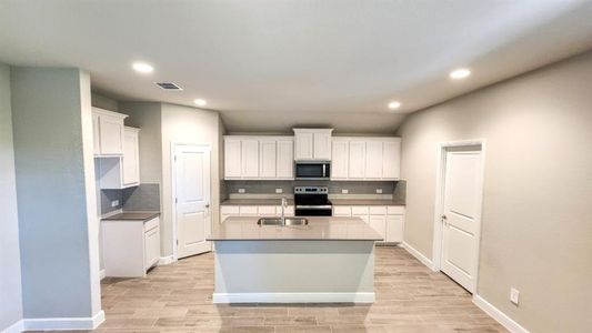 Kitchen - All Home and community information, including pricing, included features, terms, availability and amenities, are subject to change at any time without notice or obligation. All Drawings, pictures, photographs, video, square footages, floor plans, elevations, features, colors and sizes are approximate for illustration purposes only and will vary from the homes as built.