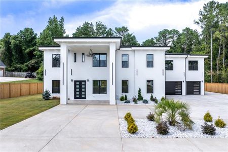 New construction Single-Family house 385 Simonton Road, Lawrenceville, GA 30045 - photo 0