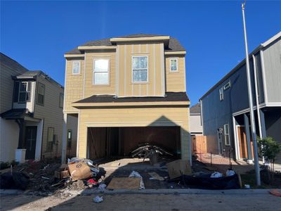 Three-story home with 3 bedrooms, 2.5 baths and 2 car garage