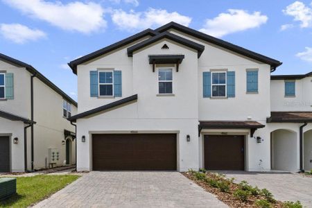 New construction Townhouse house 4566 Small Creek Road, Kissimmee, FL 34744 - photo 0