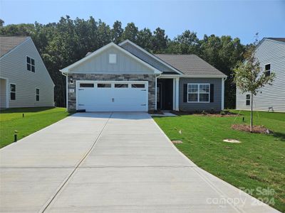 New construction Single-Family house 111 Brixham Loop, Troutman, NC 28166 - photo 0