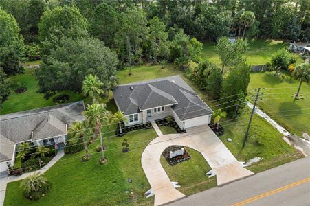 New construction Single-Family house 194 Bird Of Paradise Drive, Palm Coast, FL 32137 - photo 3 3