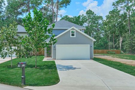 New construction Single-Family house 712 Old Magnolia Road, Conroe, TX 77304 - photo 0