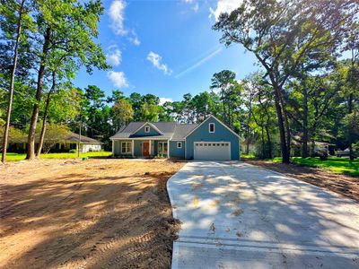 New construction Single-Family house 22918 Blackgum Drive, Magnolia, TX 77355 - photo 0 0