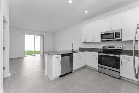 New construction Townhouse house 7521 Stone Creek Trail, Kissimmee, FL 34747 Pampas- photo 5 5