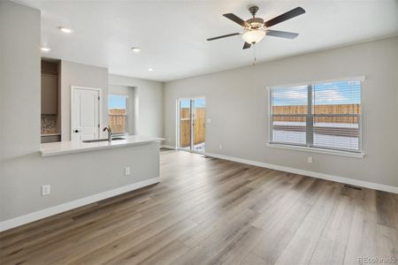 New construction Single-Family house 9406 Yampa Court, Commerce City, CO 80022 - photo 4 4