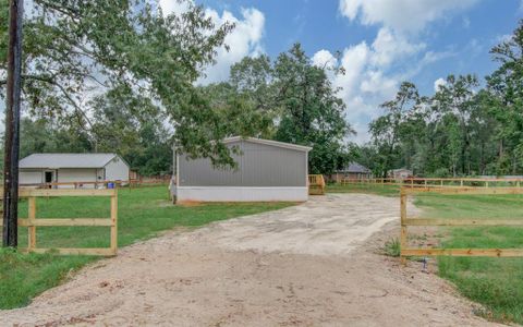 New construction Single-Family house 148 County Road 328, Cleveland, TX 77327 - photo 41 41