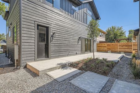 Expansive backyard patio perfect for relaxing and entertaining.