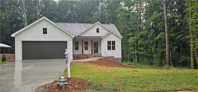 New construction Single-Family house 304 Hidden Court, Woodstock, GA 30189 - photo 0