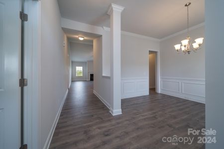 Foyer into Dining Room. Photo representation. Colors and options will differ.