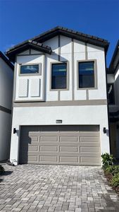 New construction Townhouse house 10400 Ebb Tide Lane, Orlando, FL 32821 - photo 0