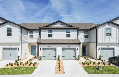 New construction Townhouse house 13175 Stillmont Place, Tampa, FL 33624 Evergreen- photo 0