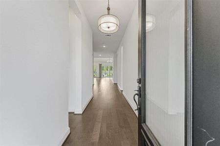 Step into this home’s entryway and feel the warmth and charm immediately! With bright, inviting vibes, this space is perfect for greeting guests with a big smile.