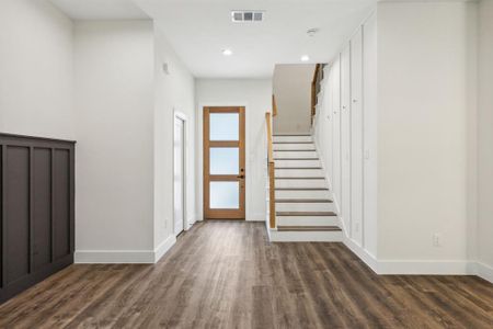 View looking back towards the entry foyer, where you can imagine your child walking down the stairs to meet their first date.