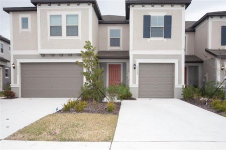 New construction Townhouse house 31722 Blue Passing Loop, Wesley Chapel, FL 33545 - photo 0 0