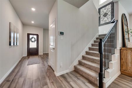 Entryway featuring hardwood / wood-style floors