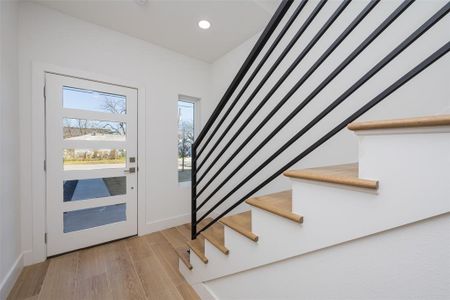 Foyer featuring hardwood / wood-style floors