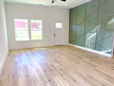 Entryway featuring light hardwood / wood-style floors, plenty of natural light, and ceiling fan