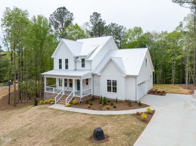New construction Single-Family house 987 Browning Place, Youngsville, NC 27596 - photo 0