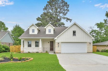 New construction Single-Family house 9848 Twin Shores Drive, Willis, TX 77318 - photo 0 0