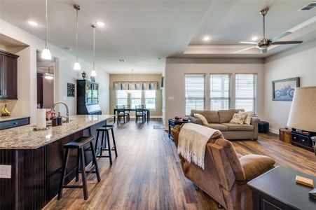 Open floor plan perfect for entertaining and low-maintenance LVP flooring