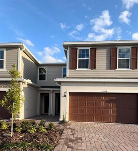 New construction Townhouse house 4828 Noble Cypress Street, Kissimmee, FL 34746 Powell- photo 0