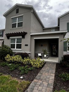 New construction Townhouse house 11473 Listening Drive, Orlando, FL 32832 - photo 0