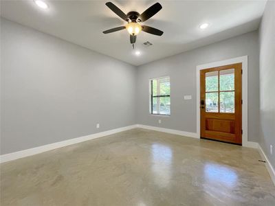 Entryway featuring ceiling fan