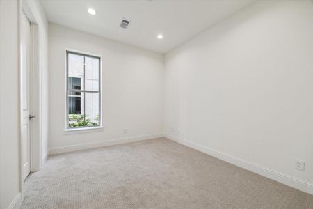 1st floor bedroom with natural light.