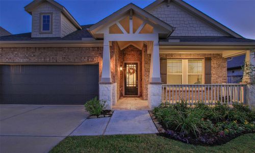 Discover the allure of this captivating Craftsman bungalow, boasting serene front and back covered porches for your ultimate relaxation and social gatherings.