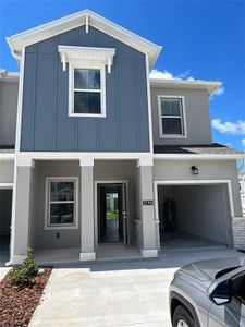 New construction Townhouse house 3194 Laurent Loop, Davenport, FL 33837 - photo 0