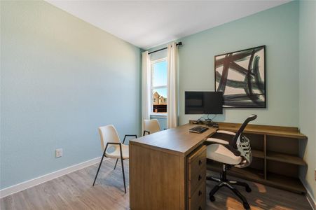Office featuring hardwood / wood-style flooring