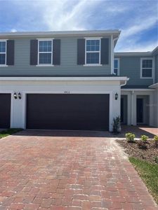 New construction Townhouse house 4812 Noble Cypress Street, Kissimmee, FL 34746 - photo 0