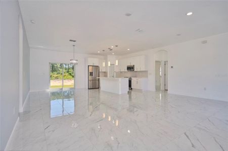 Open concept living!  Look at that beautiful porcelain tile