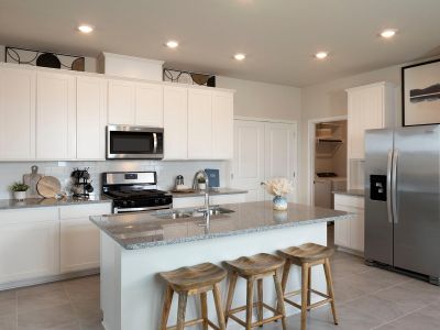 Enjoy the spacious kitchen complete with a kitchen island.