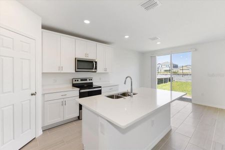 New construction Single-Family house 1433 Sea Glass Road, Haines City, FL 33844 Bluebell- photo