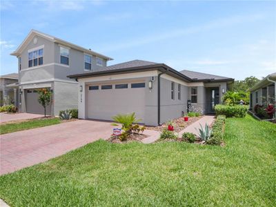 New construction Single-Family house 3149 Songbird Circle, Saint Cloud, FL 34773 - photo 0 0