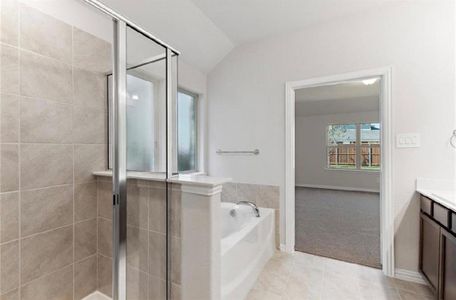 Bathroom featuring Garden tub and Separate Shower.