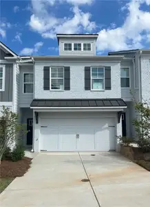 New construction Townhouse house 1610 Nancy Jo Lane, Conyers, GA 30013 - photo 0