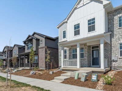 The Woodland floorplan exterior image taken at a Meritage Homes community In Aurora, CO.