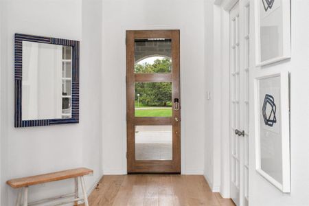 Foyer with light wood-type flooring