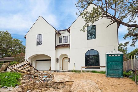 This home is an absolute WOW and is very close to completion.  The curb appeal will be second to none with gorgeous gas lanterns, copper guttery, soon to come custom wood door with peak panel and custom garage door in neutral accent tones, Pennsylvania blue porcelain entry tile and lush landscaping.  Photo as of 9/3/2024