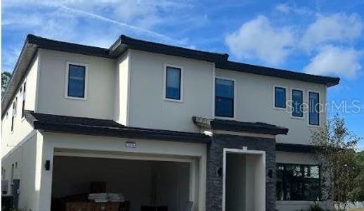 New construction Single-Family house 1318 Butterfly Orchid Road, Davenport, FL 33837 - photo 0