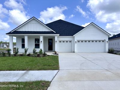 New construction Single-Family house 3221 Willowleaf Lane, Green Cove Springs, FL 32043 - photo 0 0