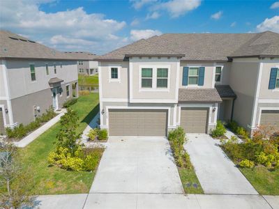 New construction Townhouse house 31588 Blue Passing Loop, Wesley Chapel, FL 33545 - photo 4 4